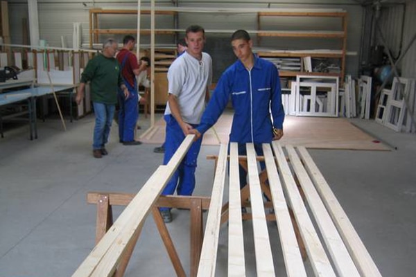 A generic square placeholder image with rounded corners in a figure.